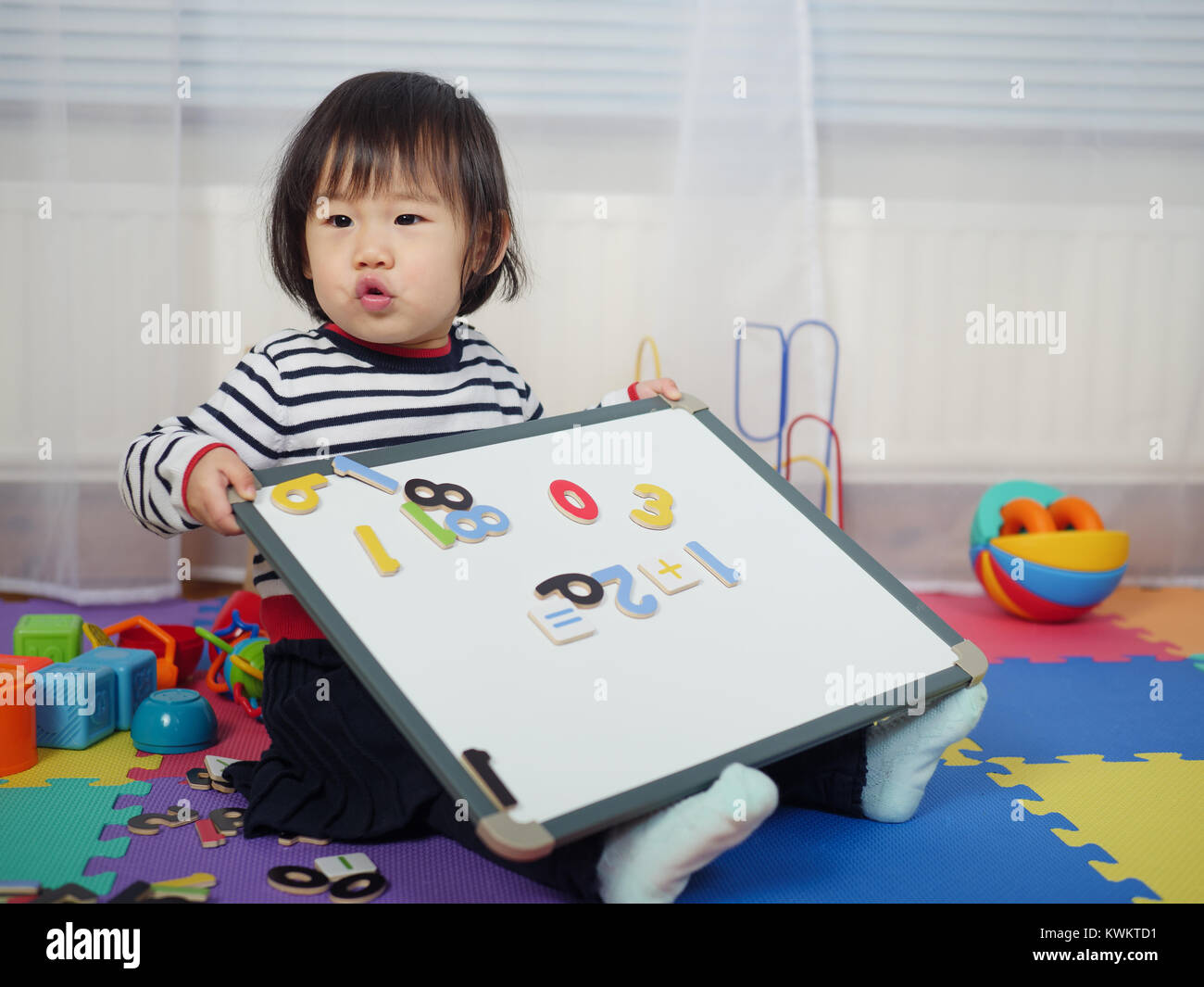 baby girl learning math at home Stock Photo - Alamy