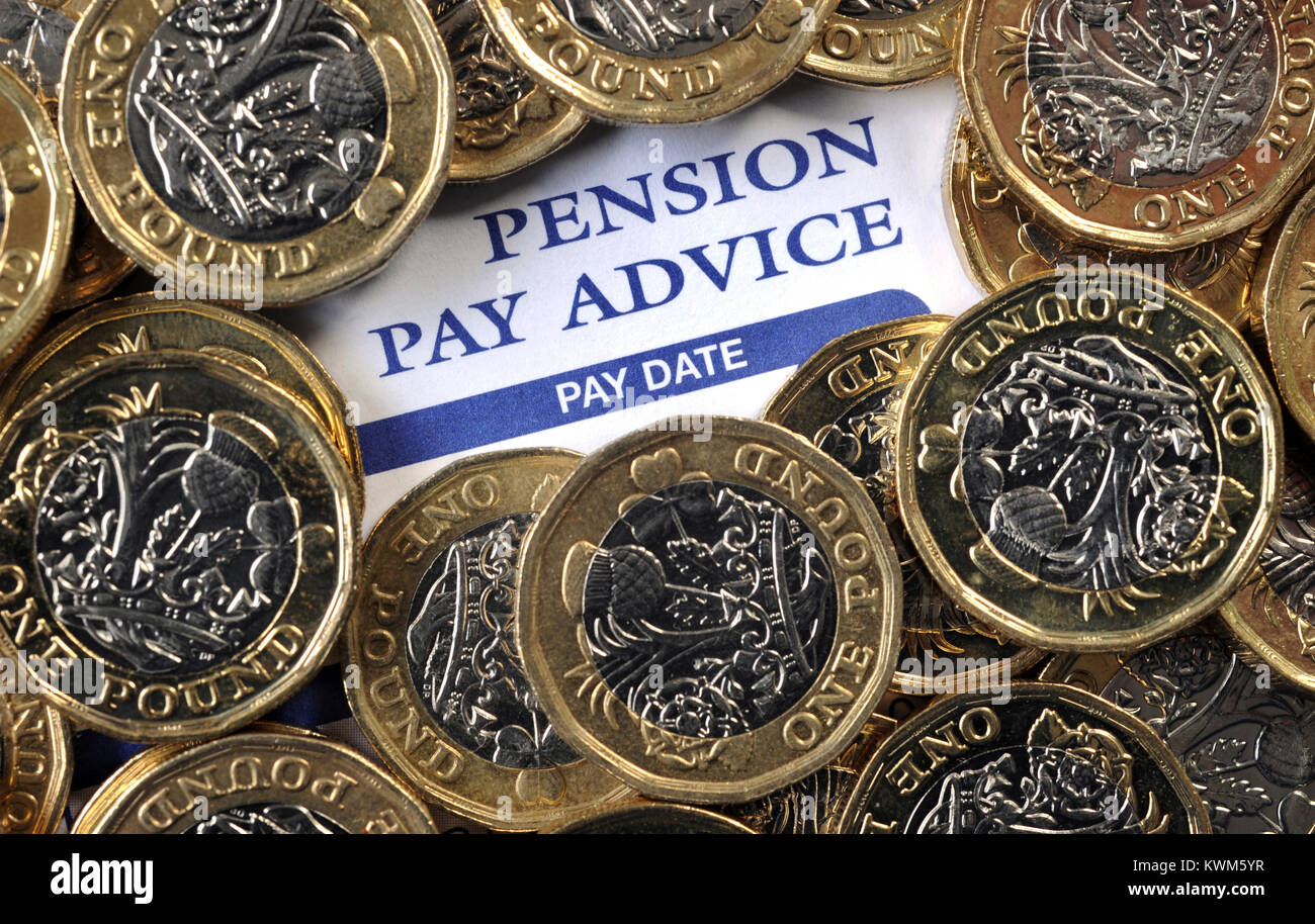 COMPANY PENSION PAY ADVICE WITH NEW ONE POUND COINS RE PENSIONS INCOMES RETIREMENT SAVINGS  ETC UK Stock Photo