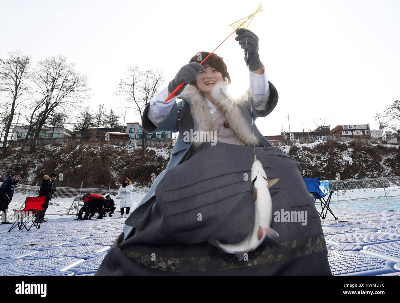 Korea. 04th Jan, 2018. Trout fishing A tourist clad in traditional