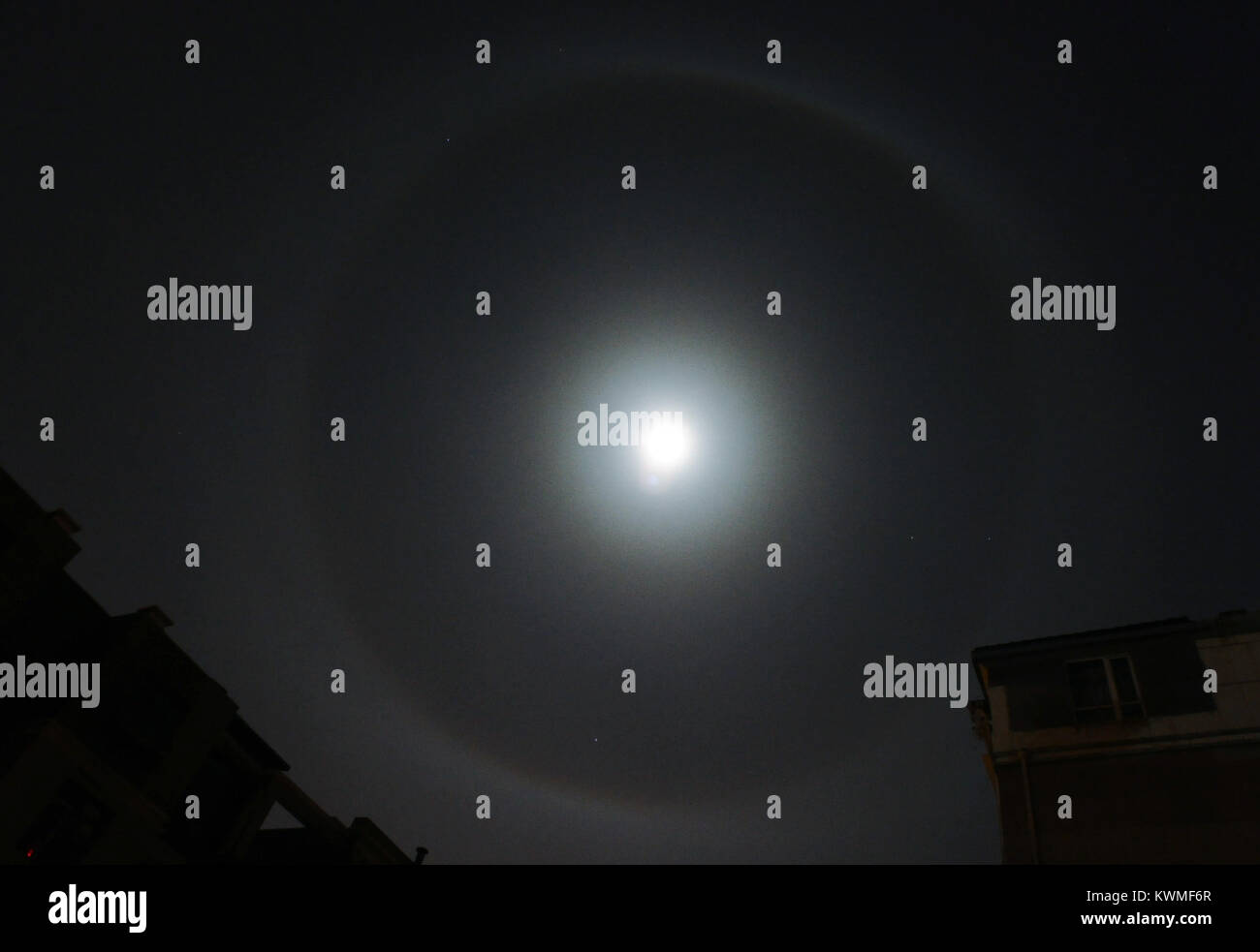 Dalian, Dalian, China. 4th Jan, 2018. Dalian, CHINA-4th January 2018 :(EDITORIAL USE ONLY. CHINA OUT).Lunar halo can be seen in the sky in Dalian, northeast China's Liaoning Province. Credit: SIPA Asia/ZUMA Wire/Alamy Live News Stock Photo