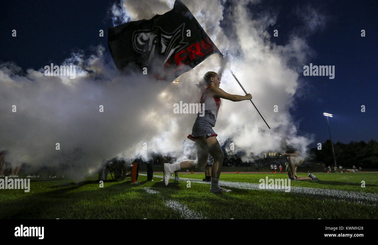 Eldridge, Iowa, USA. 22nd Sep, 2017. A North Scott cheerleader runs on