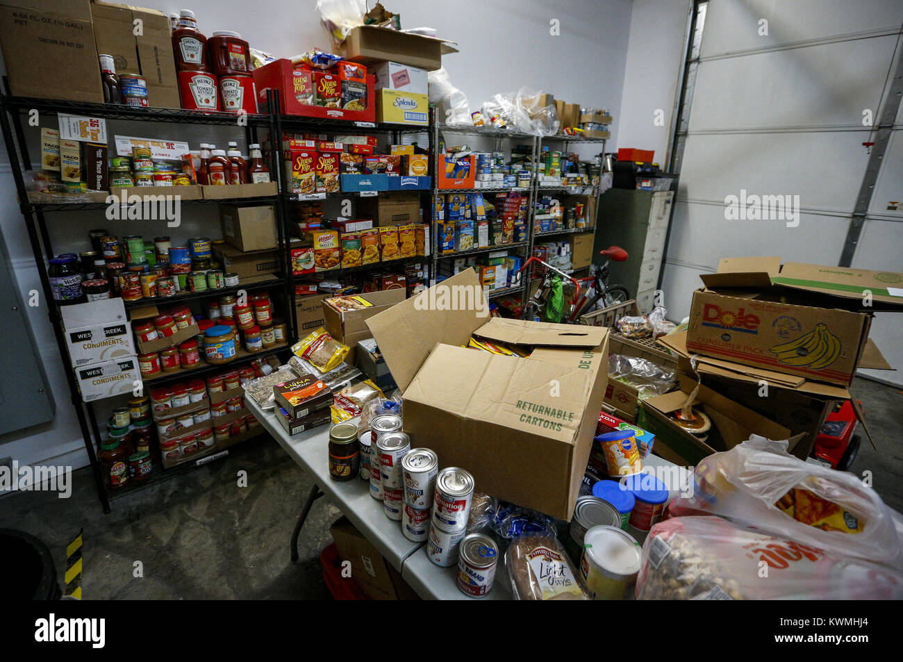 Davenport, Iowa, USA. 25th Dec, 2016. A garage converted to a food storage  room is seen at Christian Care in Rock Island on Sunday, December 25, 2016.  The shelter opened for dinner