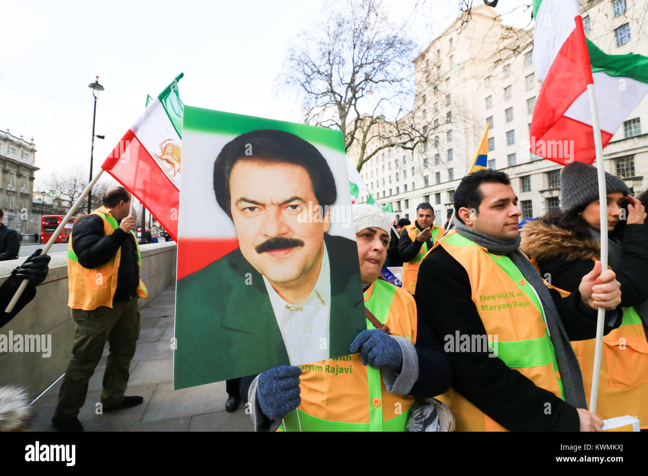 London UK. 4th January 2018. A rally outside No 10 Downing Street  by members of Iran's opposition, the National Resistance of Iran (NCRI) and the People's Mojahedin Organization of Iran (PMOI/MEK)calling on the UK Government to break its silence and condemn the killings and crackdown of protesters by the Iranian clerical regime of President Rouhani and Supreme leader  Ayatollah Ali Khamenei Stock Photo