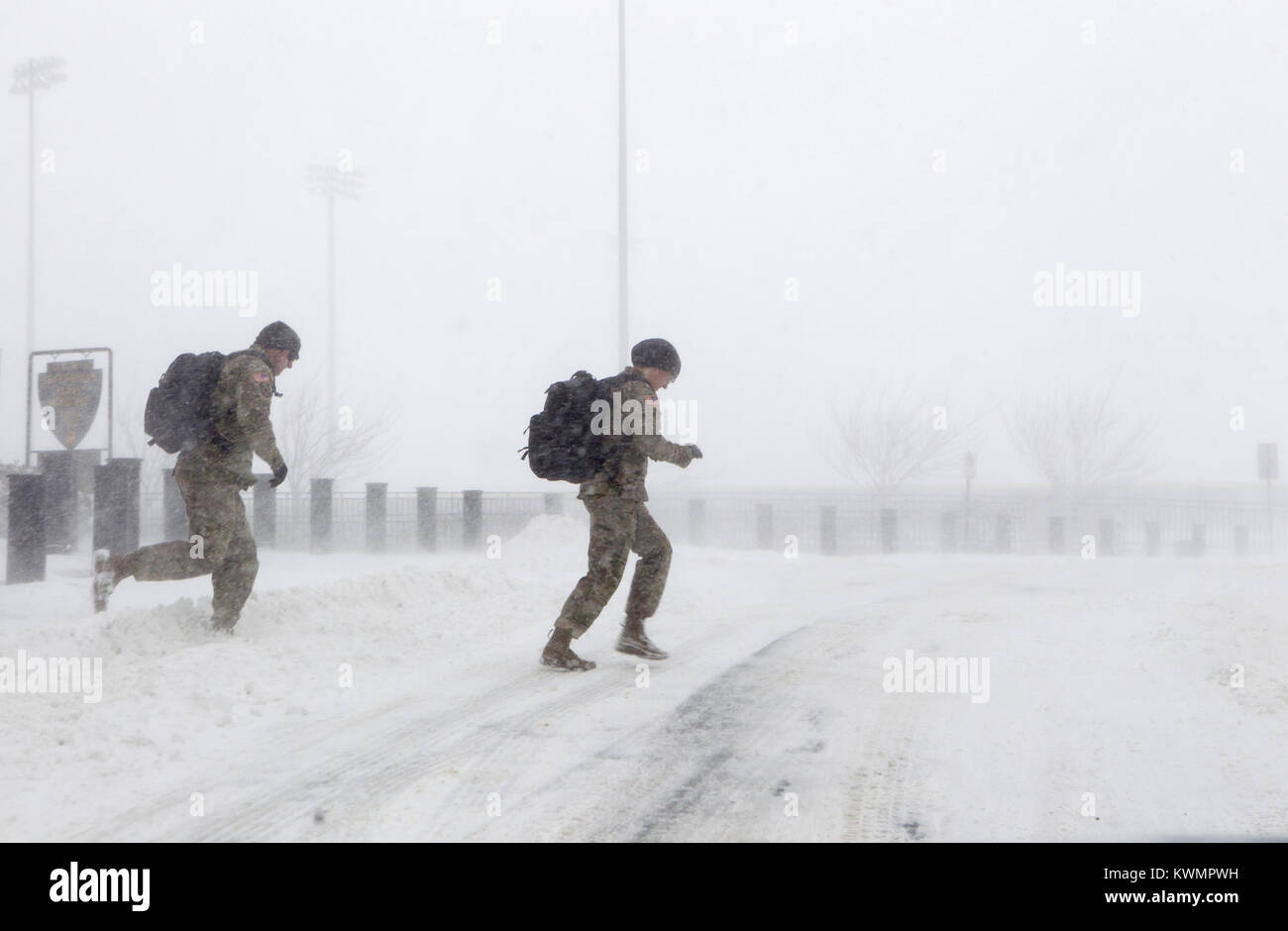 Highland Falls, New York, USA. 4th Jan, 2018. U.S - January 4, 2018 - Cadets cross Thayer Road as they brave the harsh weather of the ''Bomb Cyclone that is pommeling the East Coast Thursday morning at United States Military Academy West Point, NY. Credit: Michael Lopez/ZUMA Wire/Alamy Live News Stock Photo
