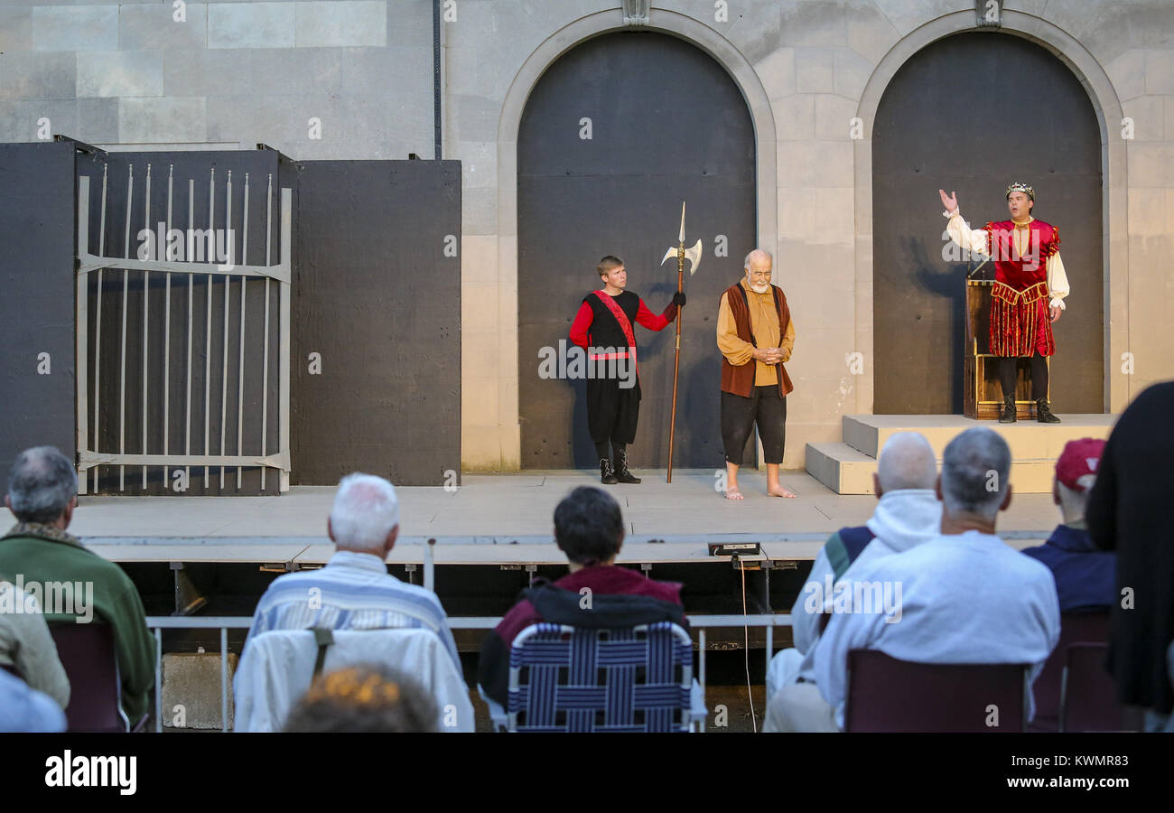 Rock Island, Iowa, USA. 25th June, 2017. James Alt playing the gaoler, left, Earl Strupp as Aegeon, center, and Misha Hooker as Duke Solinus play an early scene in The Comedy of Errors' at Lincoln Park in Rock Island on Sunday, June 25, 2017. The Genesius Guild presented Shakespeare's The Comedy of Errors' as a part of their free classical theater series to run though Aug. 6. Credit: Andy Abeyta, Quad-City Times/Quad-City Times/ZUMA Wire/Alamy Live News Stock Photo