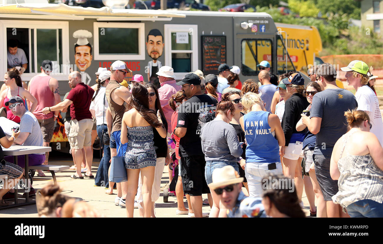 Leclaire, Iowa, USA. 10th June, 2017. Lines and lines of people waiting outside all of the food trucks and trailers to be served, Saturday, June 10, 2017, during a food truck fight on the levee in LeClaire. Credit: John Schultz/Quad-City Times/ZUMA Wire/Alamy Live News Stock Photo