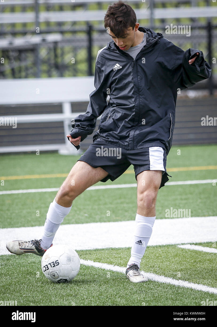 Bettendorf, Iowa, USA. 14th Apr, 2017. Junior Zach Elias, 17, warms up before practice at Bettendorf High School on Friday, April 14, 2017. Credit: Andy Abeyta, Quad-City Times/Quad-City Times/ZUMA Wire/Alamy Live News Stock Photo