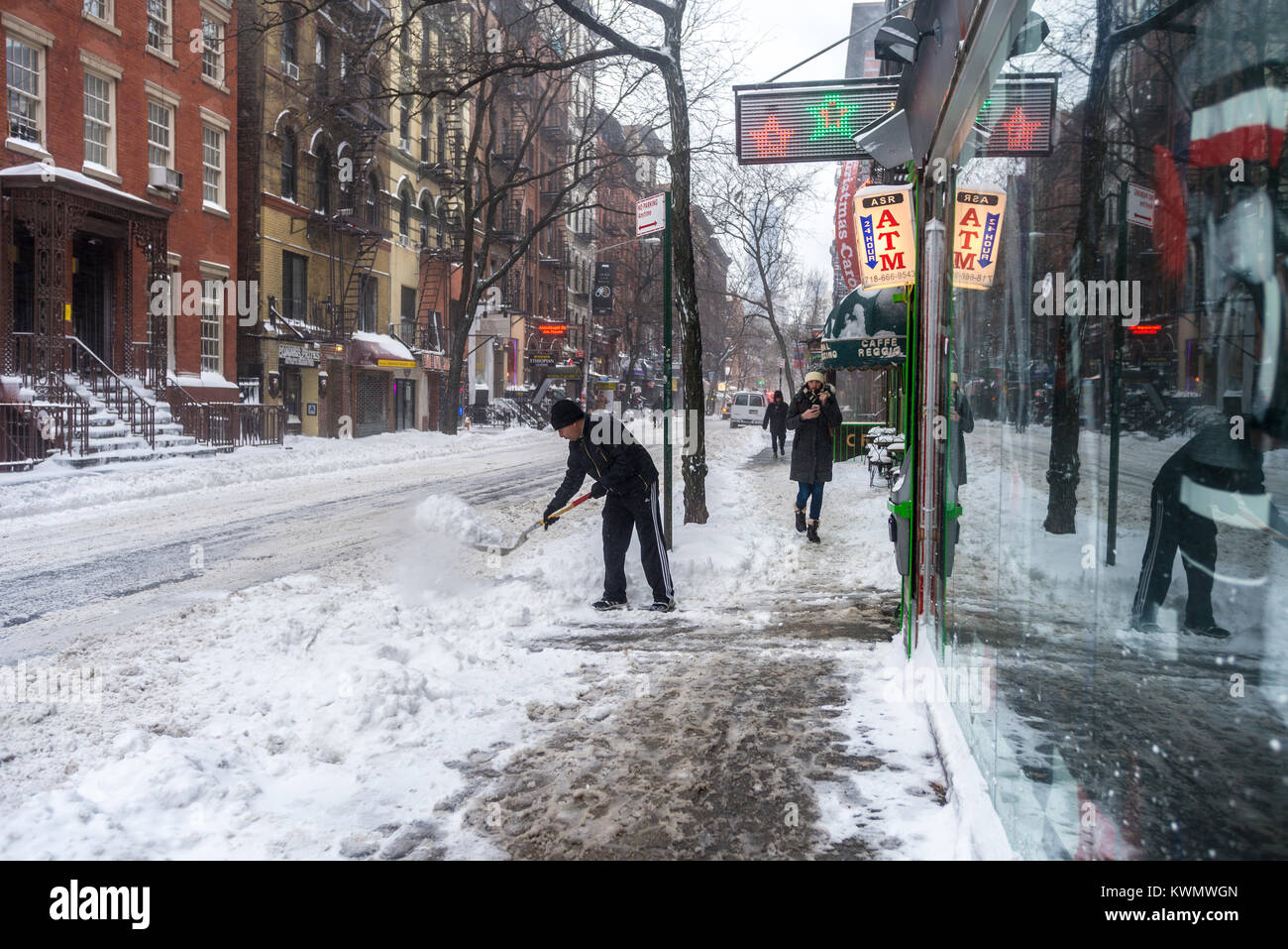 New York, USA. 4th Jan, 2018. New Yorkers trudge through the first snowstorm of  2018. The unusual storm, called a 'Bomb Cyclone' covered the eastern part of the US, from Florida to the Northeast and intensified Wednesday. It is expected to be one of he strongest storms in US history. CREDIT: ©Stacy Walsh Rosenstock/Alamy Live News Stock Photo