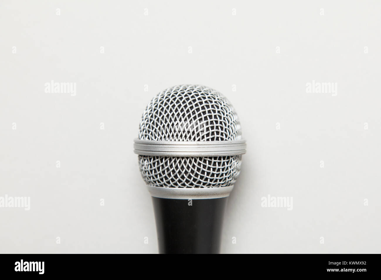 microphone on a plain grey background Stock Photo Alamy