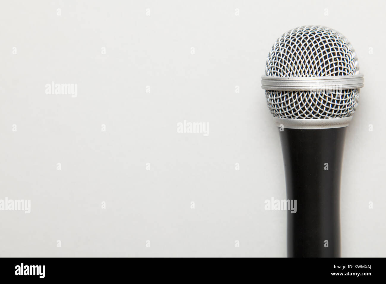 microphone on a plain grey background Stock Photo Alamy