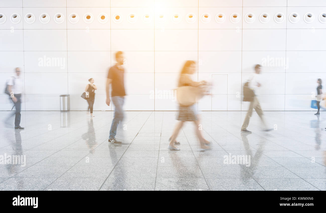 Blurred business people walking Stock Photo - Alamy