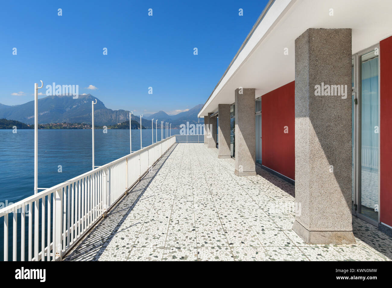 Image showcasing Panoramic view from the balcony of an old penthouse, lake and mountains ...