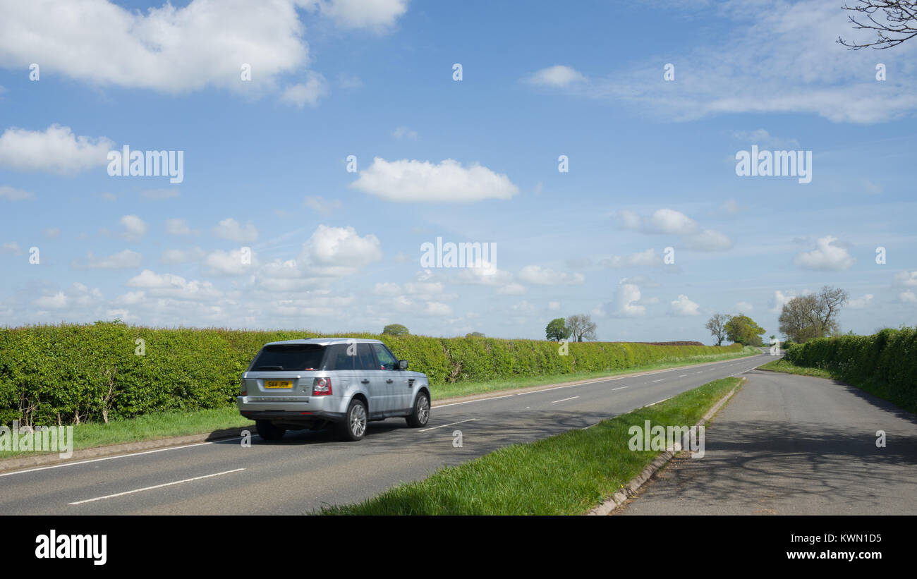 A Range Rover Sport on the B4455 Fosse Way near Ettington, Warwickshire, England, UK Stock Photo
