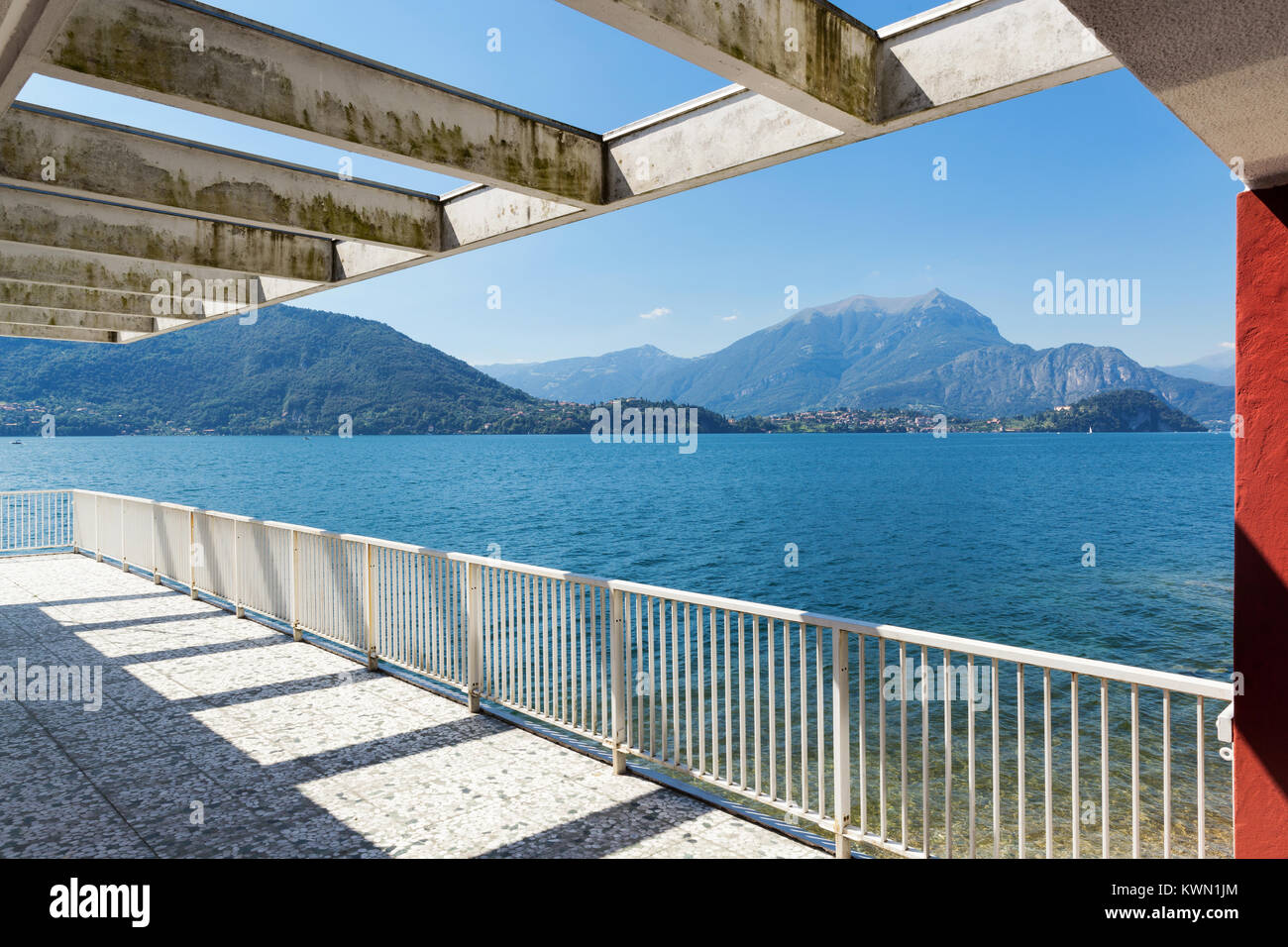 Image showcasing Panoramic view from the balcony of an old penthouse, lake and mountains ...