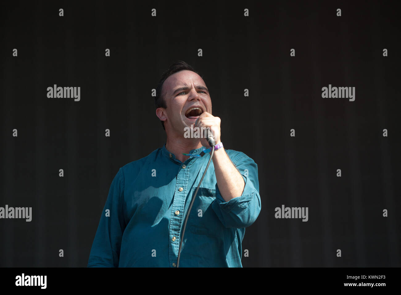 The American synthpop band Future Islands performs a live concert at