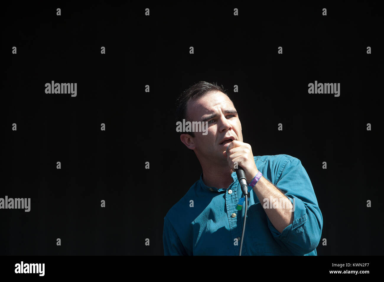 The American synthpop band Future Islands performs a live concert at