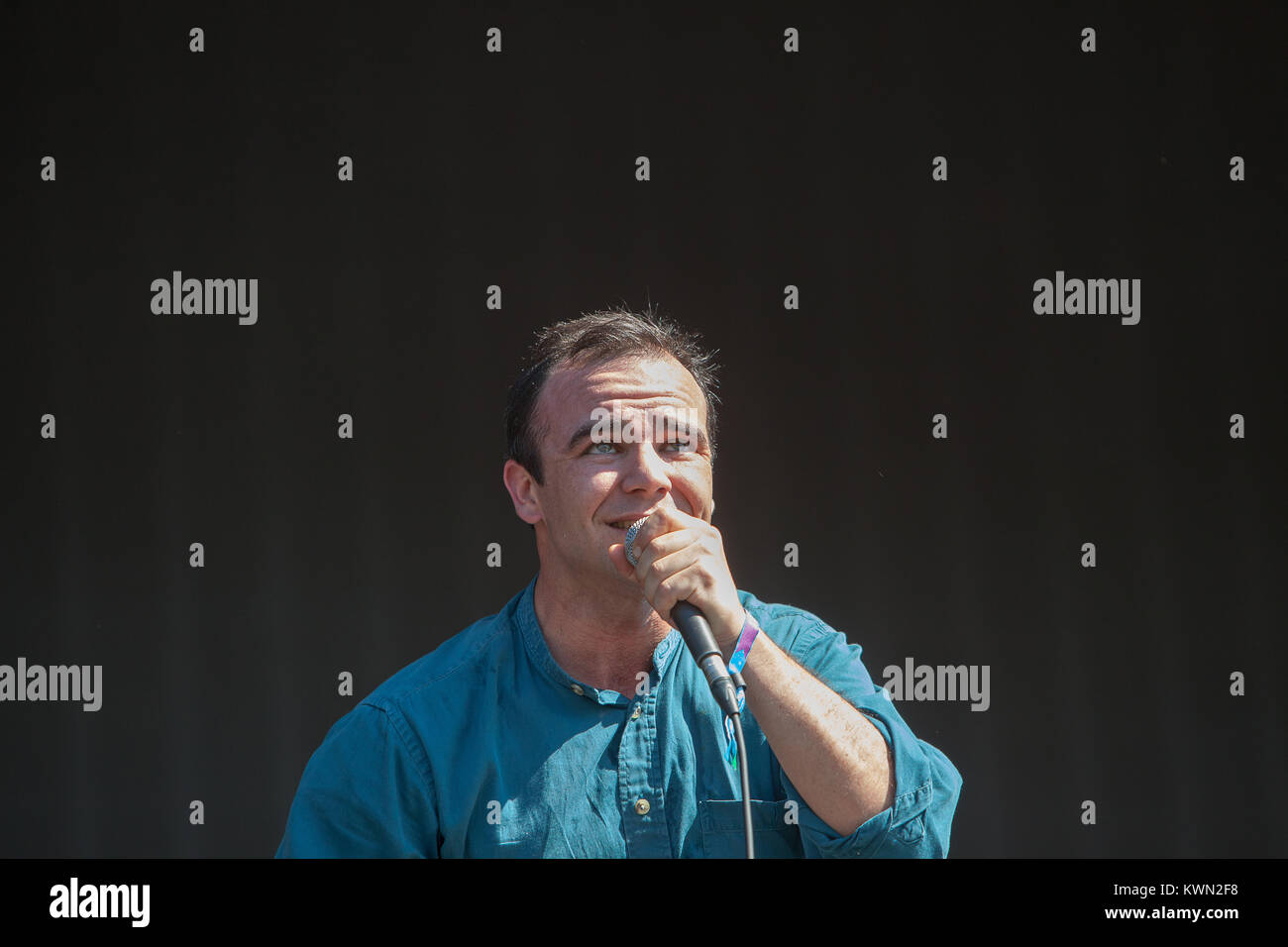The American synthpop band Future Islands performs a live concert at