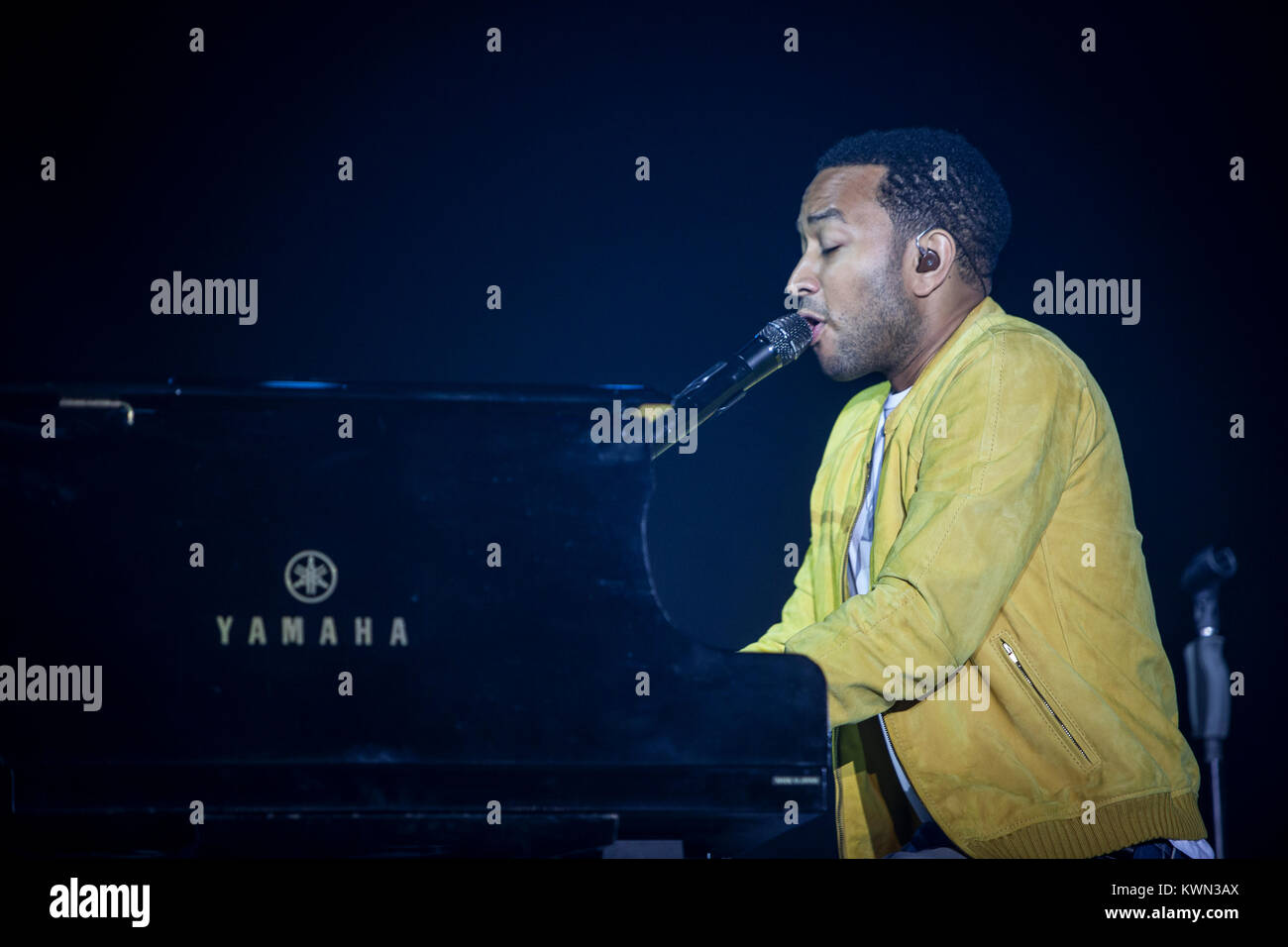 R&B singer and musician John Legend pictured behind his piano at a live gig  at the German hip-hop festival Splash Festival. Germany 2013 Stock Photo -  Alamy