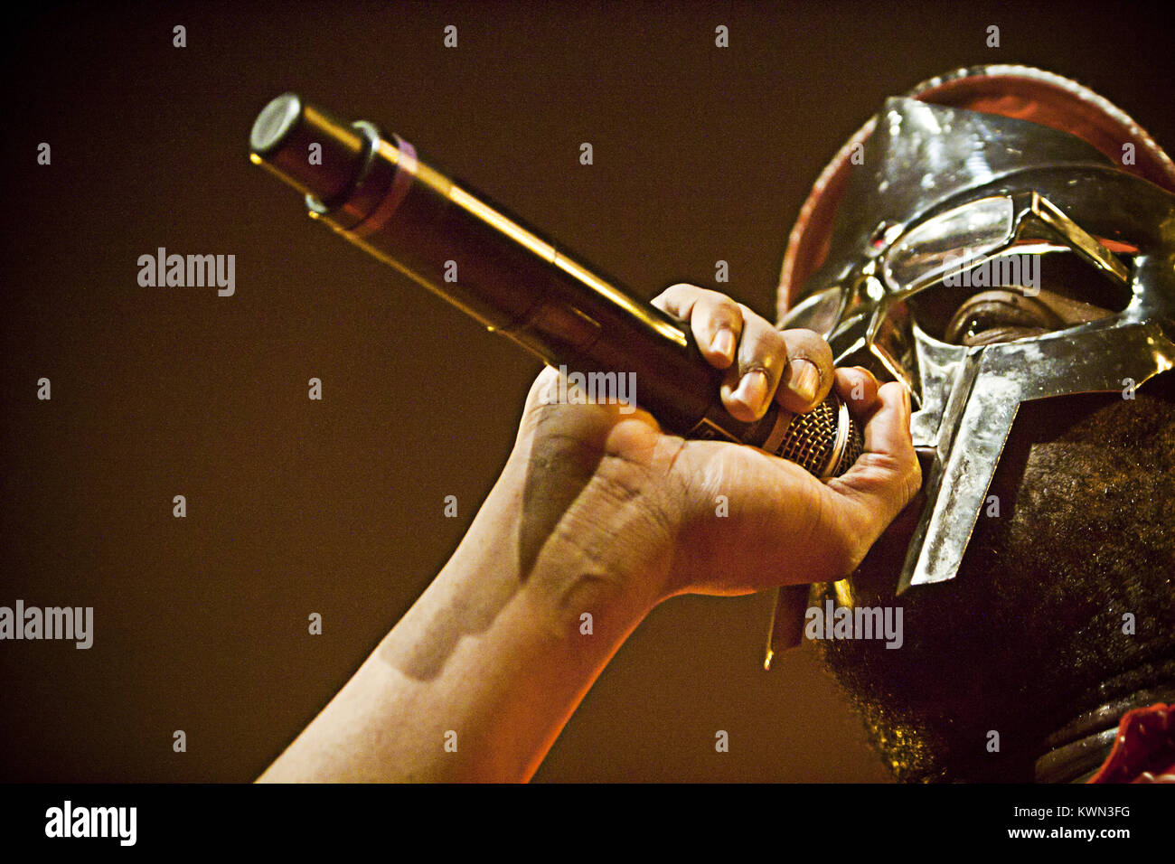 The American rapper Daniel Dumile is better known by one of his many aliases: King Geedorah, Metal Fingers, Viktor Vaughn, Zev Love or like here pictured as MF Doom at a live concert at Vega in Copenhagen. Denmark 01/11 2010. Stock Photo