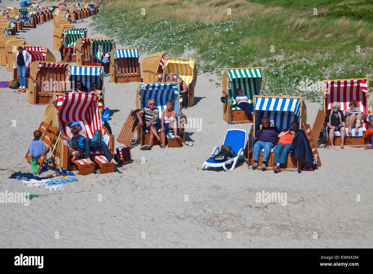 People with beach chairs at the beach of Wustrow, Fishland, Mecklenburg-Western Pomerania, Baltic sea, Germany, Europe Stock Photo