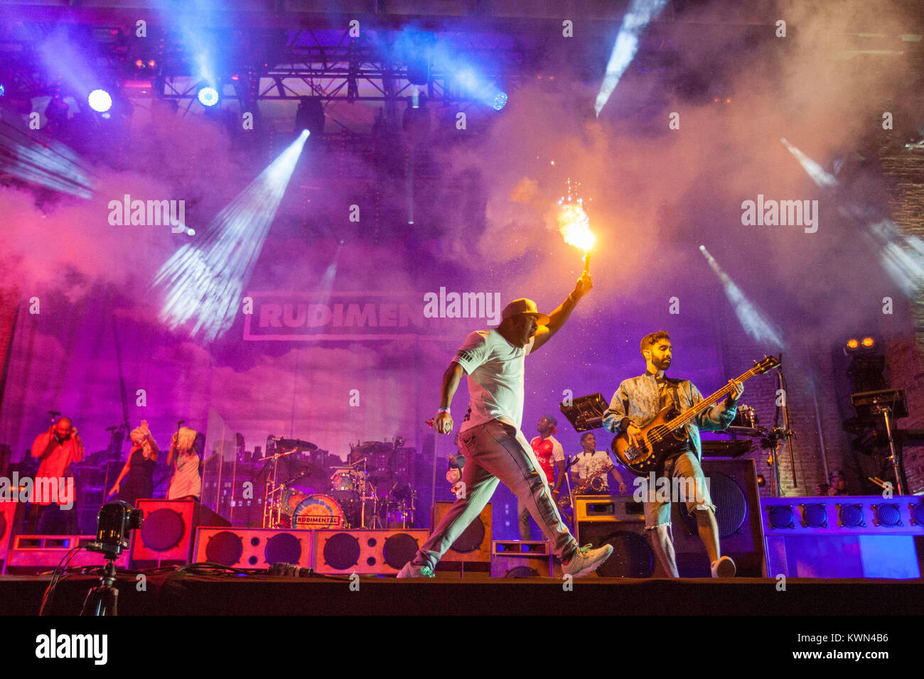 The English drum and bass band Rudimental performs a live concert at the British music festival Lovebox 2015 in London. Here DJ Locksmith (L) is pictured live on stage with musician Amir Amor (R). United Kingdom, 17/07 2015. Stock Photo