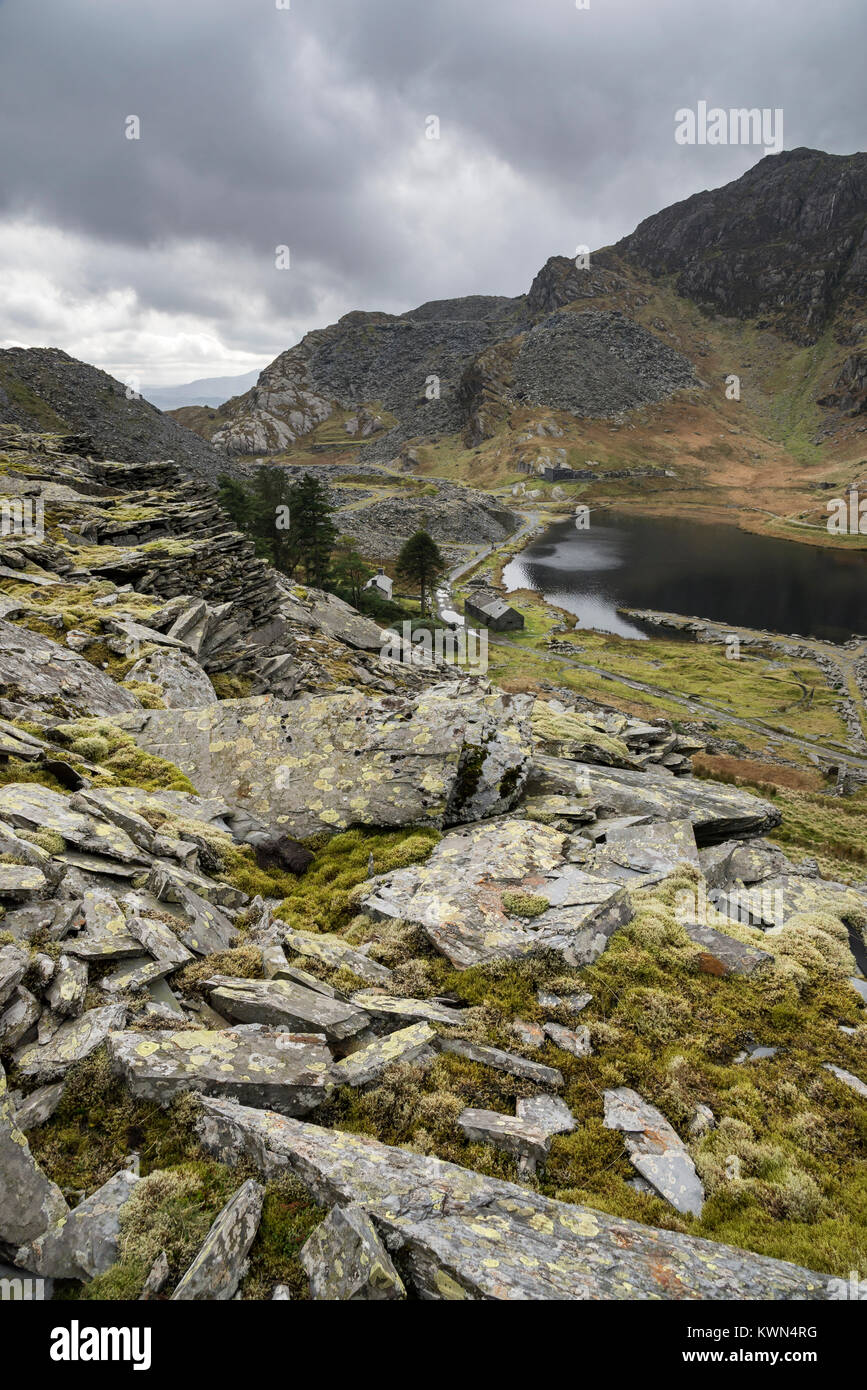 Dramatic landscape around Llyn Cwmorthin near Blaenau Ffestiniog, North Wales. Remains of the old slate quarries surrounded by mountains. Stock Photo