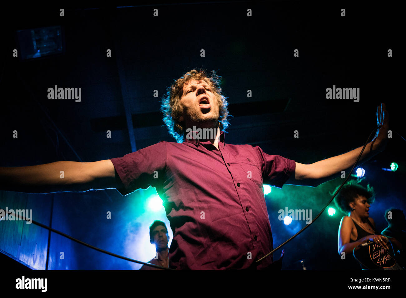 The American dance-punk band !!! (chk chk chk) performs a live concert at VEGA in Copenhagen. Here singer and songwriter Nic Offer is seen live on stage. Denmark, 27/05 2017. Stock Photo