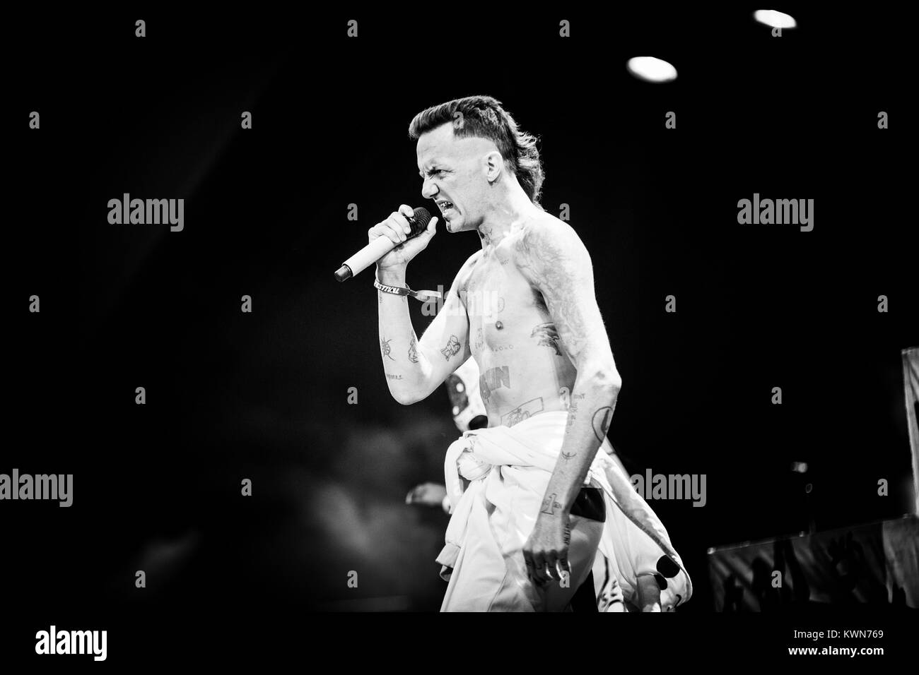 The South African rap duo Die Antwoord performs a live concert at Orange Stage at the Danish music festival Roskilde Festival 2015. The duo consists of the two rave-vocalist Ninja (pictured) and YoLandi Visser who perform lyrics in Afrikaans, Xhosa and English. Denmark, 03/07 2015. Stock Photo