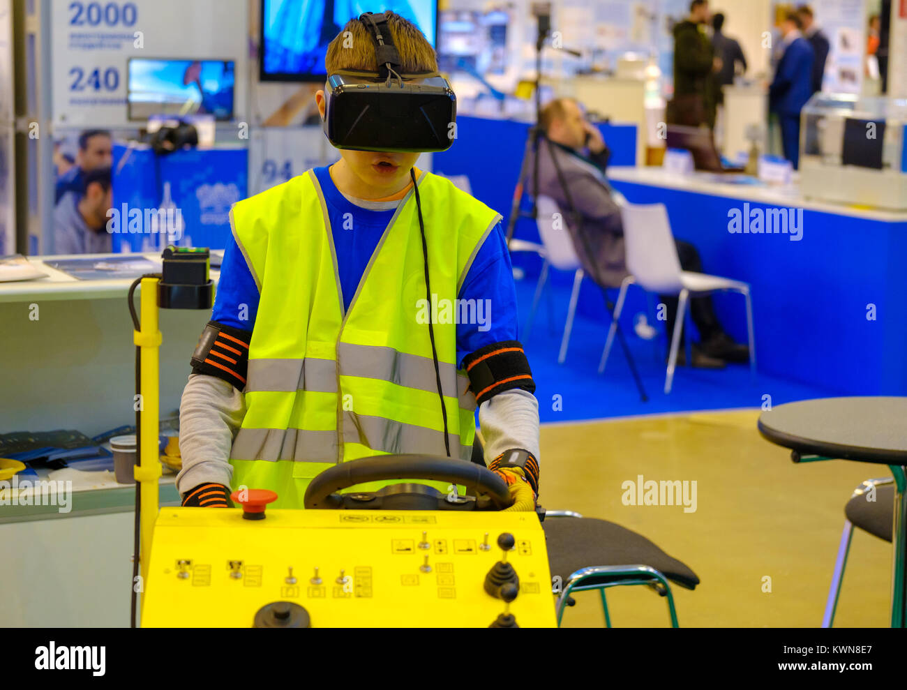 Industrial simulator of the airplane ladder driving is demonstrated at the exhibition Stock Photo