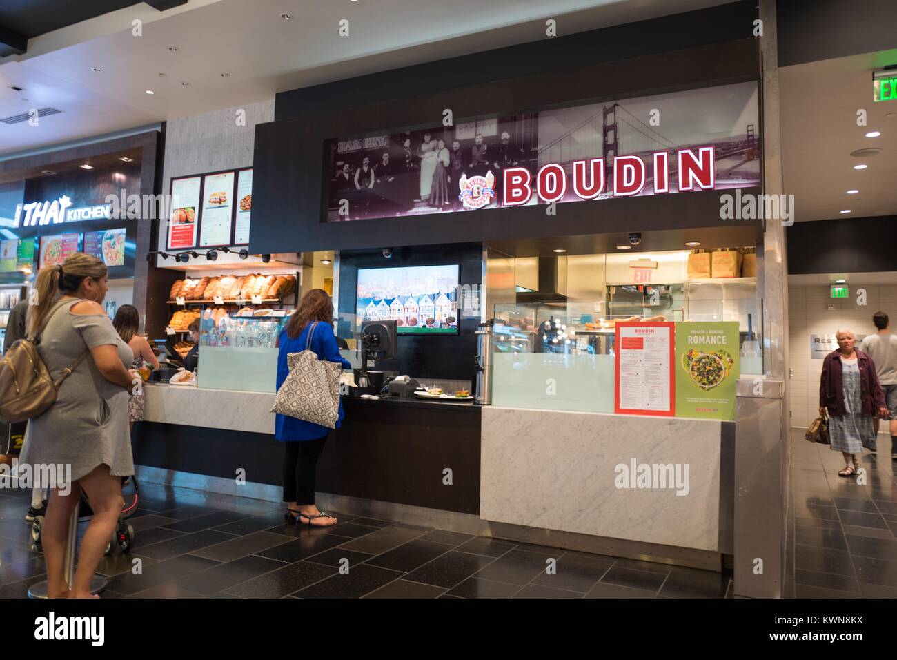 Guests order food at Boudin, a San Francisco chain restaurant serving sourdough bread, at the Westfield Valley Fair shopping mall in the Silicon Valley town of San Jose, California, July 25, 2017. Stock Photo