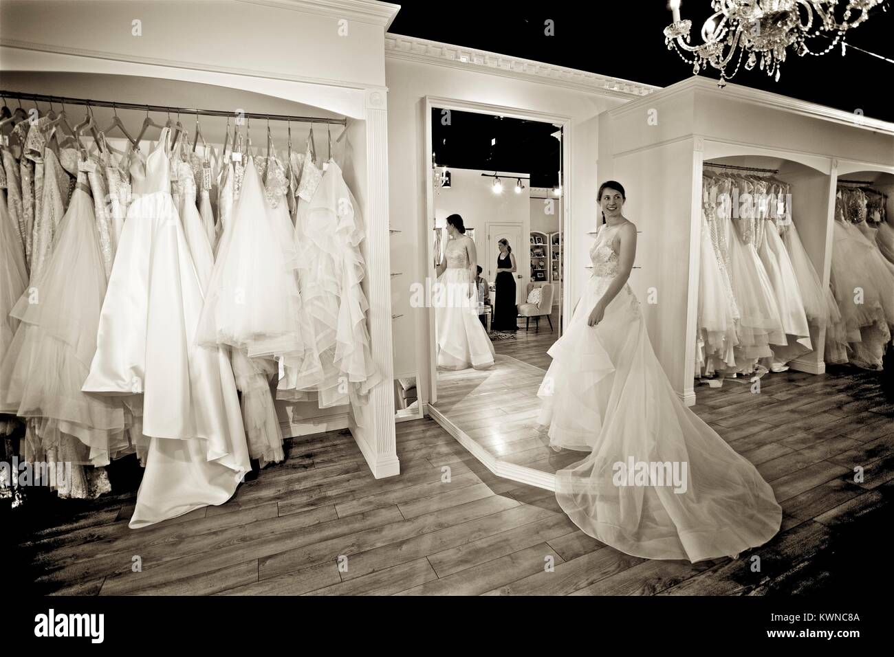 Bridal gown fitting at a bridal boutique Stock Photo