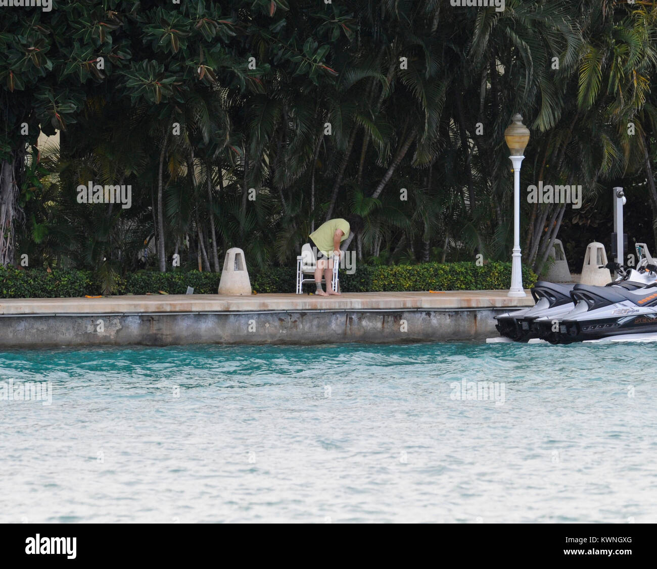 MIAMI BEACH, FL - JUNE 11:  (EXCLUSIVE COVERAGE) Rosie O'Donnell (wearing no make up and a bandage on her foot.)  Enjoys her day as she sits on her dock texting from her estate in Miami. Roseann 'Rosie' O'Donnell (born March 21, 1962) is an American stand-up comedienne, actress, singer, author and media personality. She has also been a magazine editor and continues to be a celebrity blogger, LGBT rights activist; television producer and collaborative partner in the LGBT family vacation company R Family Vacations.   On June 11, 2011 in Miami Beach, Florida    People:  Rosie O'Donnell Stock Photo