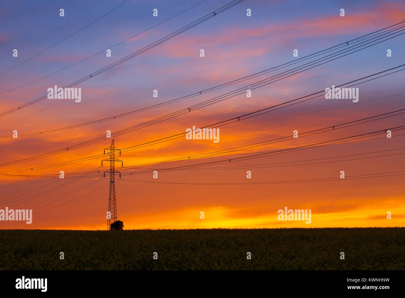 Silhouette of high voltage electrical pole structure at sunset Stock ...