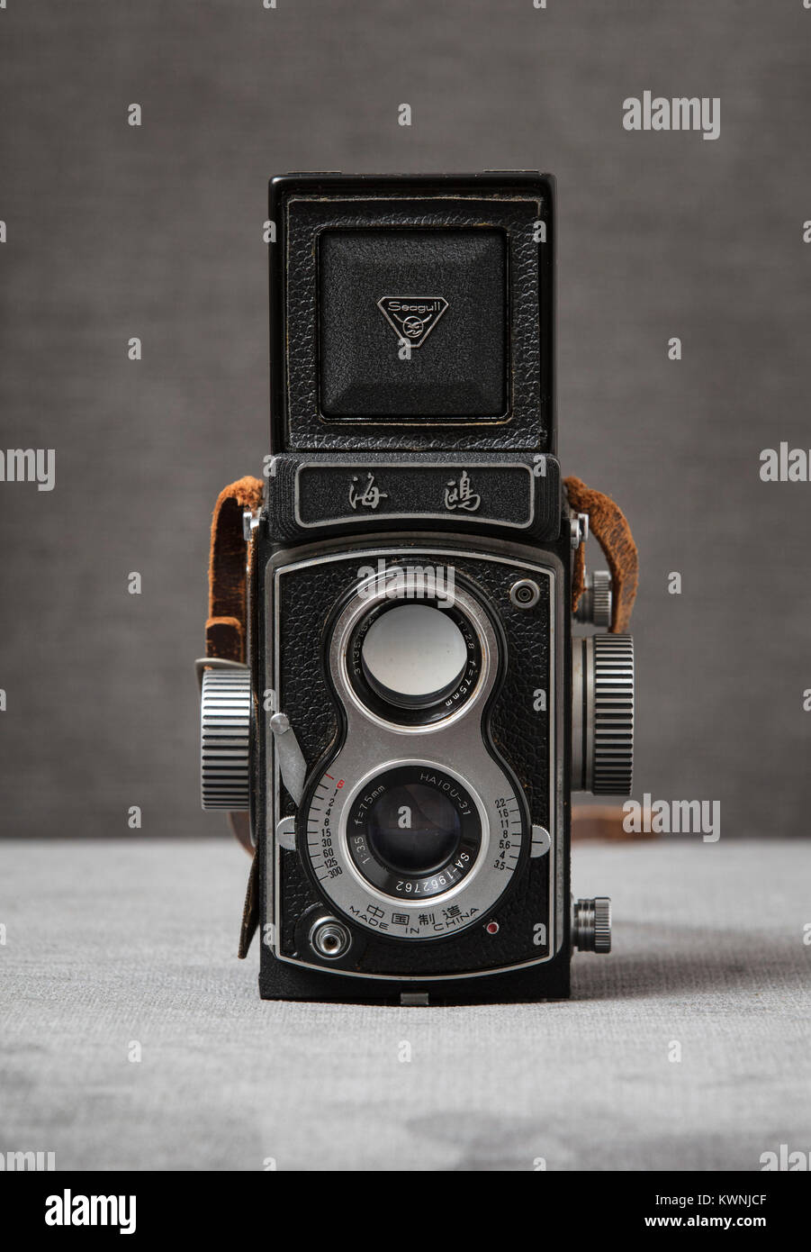A Seagull 4 TLR Twin Lens Reflex Camera with brown strap with a grey