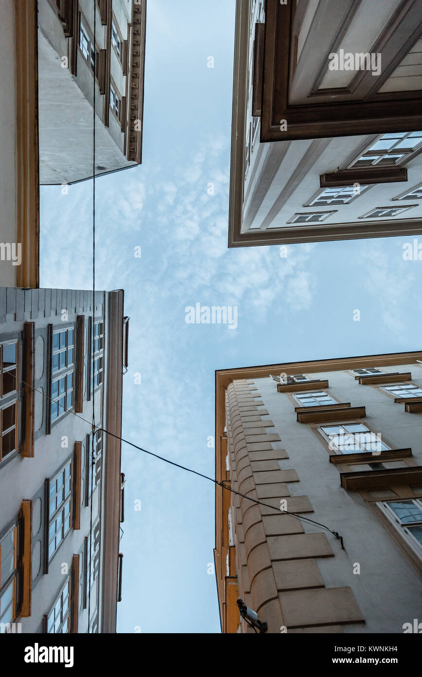 Vienna,  Austria - August 16, 2017: Old residential buildings in historical city centre of Vienna. Directly below view Stock Photo