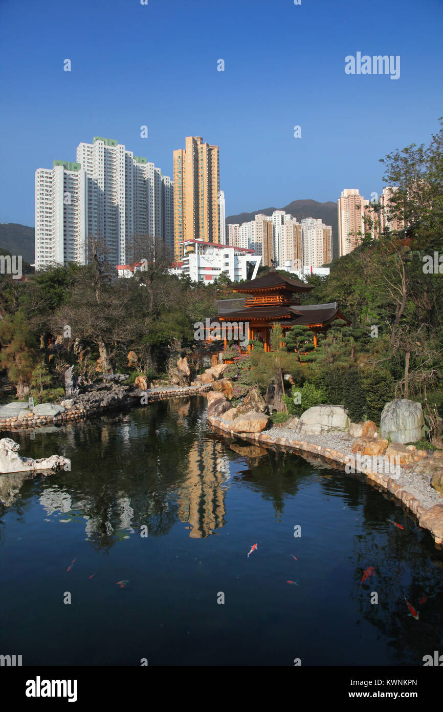 Pagoda on lake with koi fish, Chi Lin Botanical Garden, Nan Lian Garden, Hong Kong, China, Asia. Stock Photo