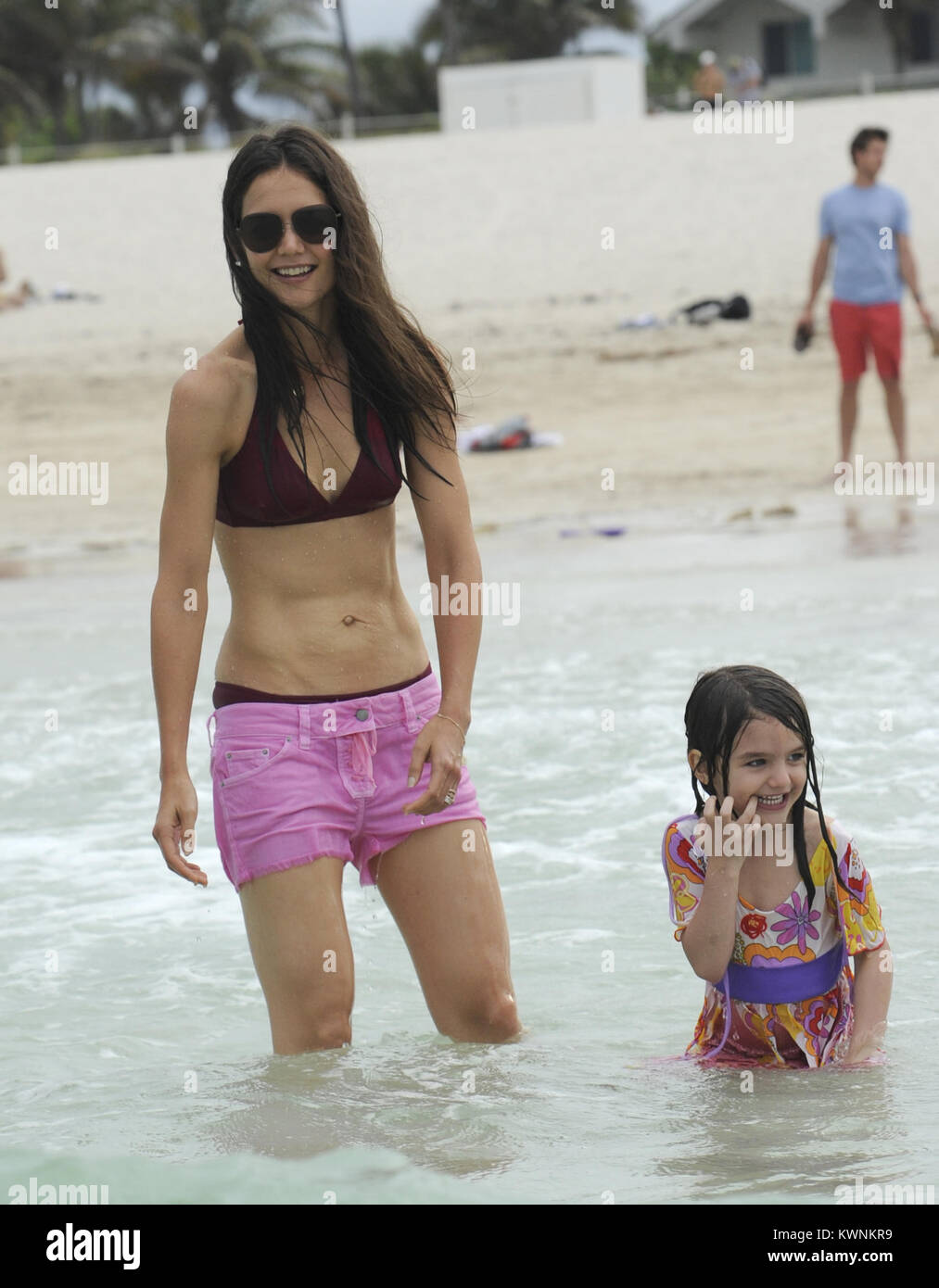 MIAMI BEACH, FL - JUNE 18: Katie Holmes and Suri Cruise had a fun day out  on beach today in Miami, outside their hotel. The famous mother and  daughter pair played in