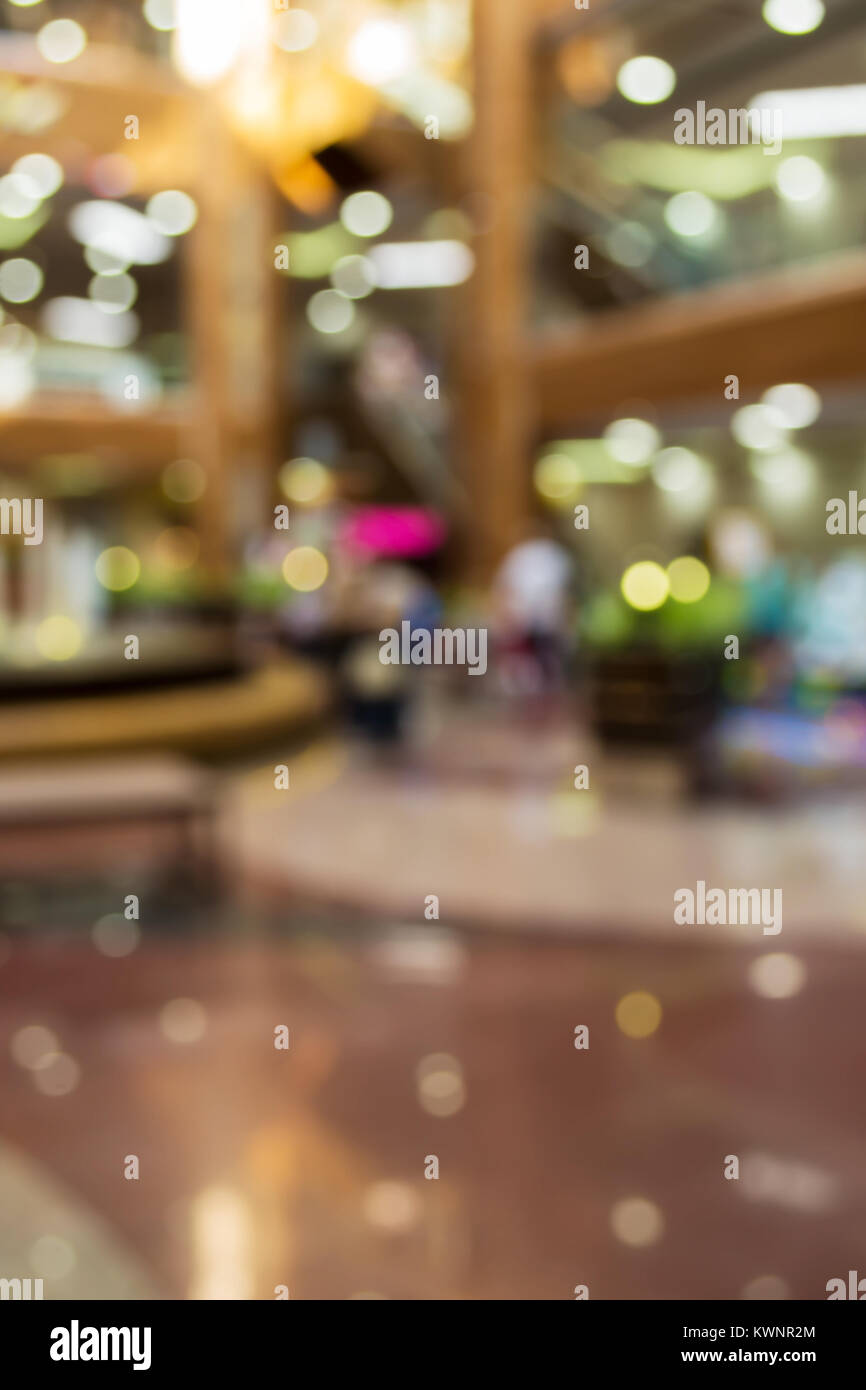 Blurred background: interior of shopping mall gallery Stock Photo - Alamy
