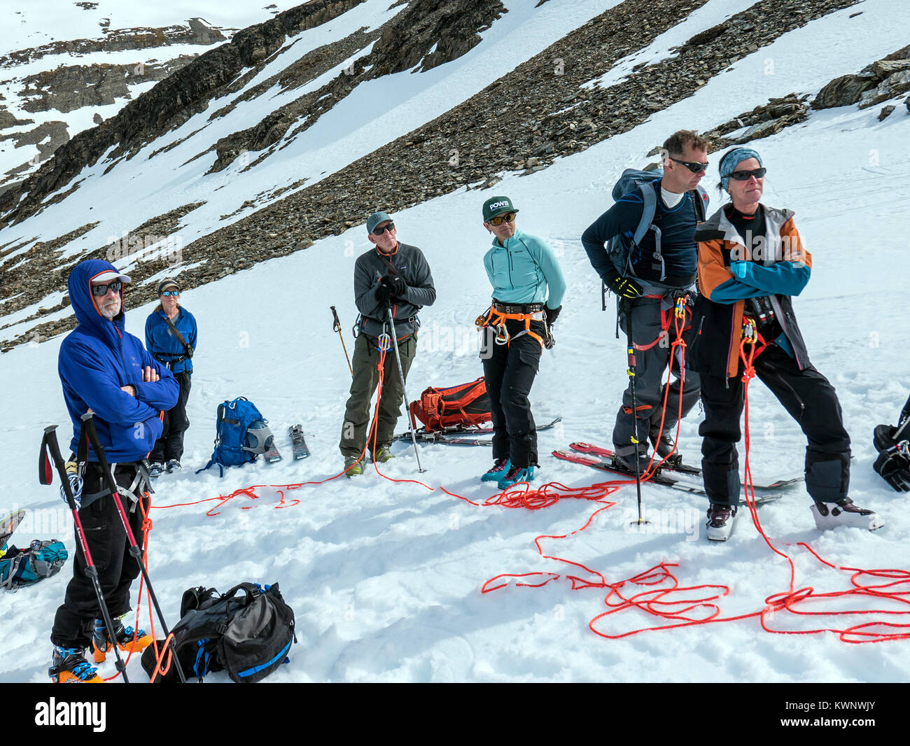 Backcountry alpine skiers practice roped glaciar crossings; Glaciar Martial; Mount Krund; Cerro Castor; near Ushuaia; Argentinanear Ushuaia; Argentina Stock Photo