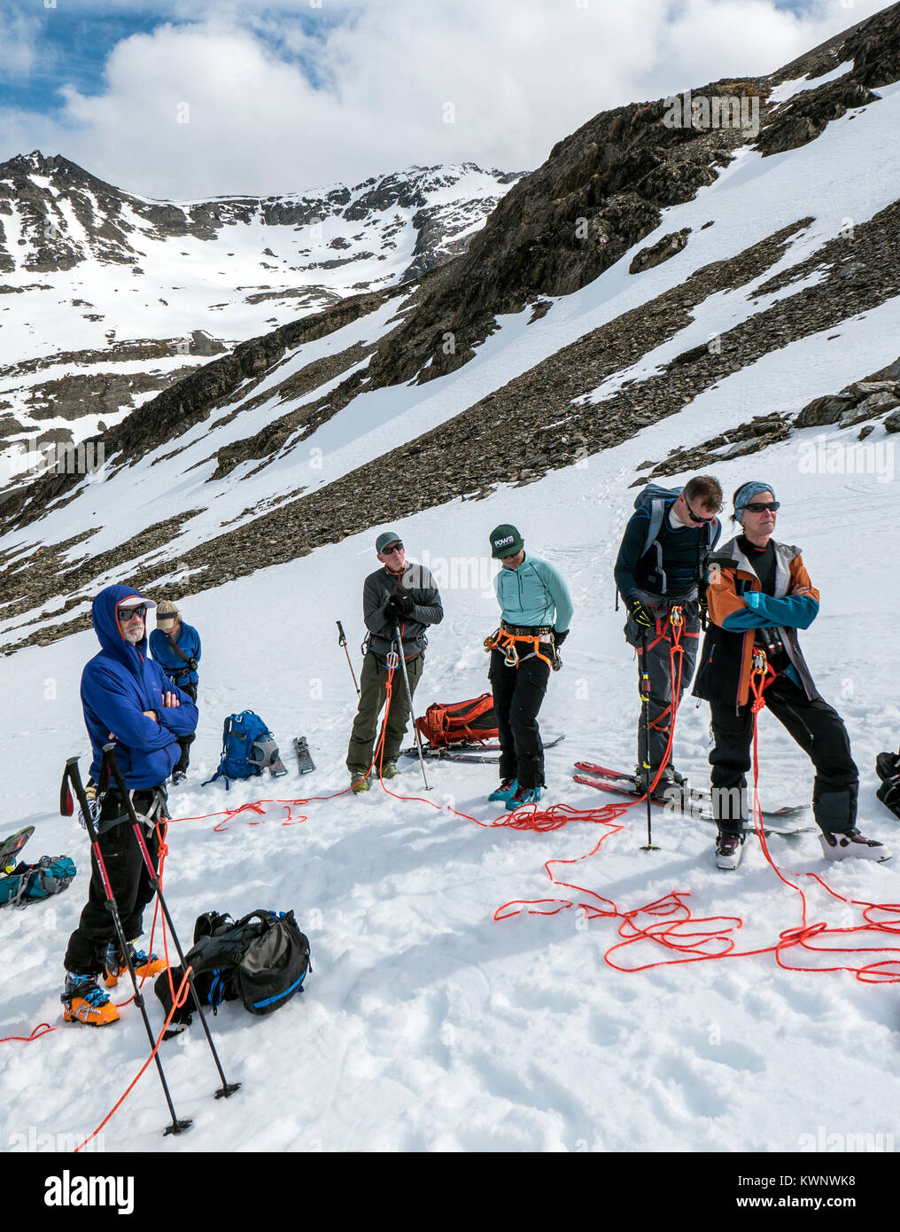 Backcountry alpine skiers practice roped glaciar crossings; Glaciar Martial; Mount Krund; Cerro Castor; near Ushuaia; Argentinanear Ushuaia; Argentina Stock Photo