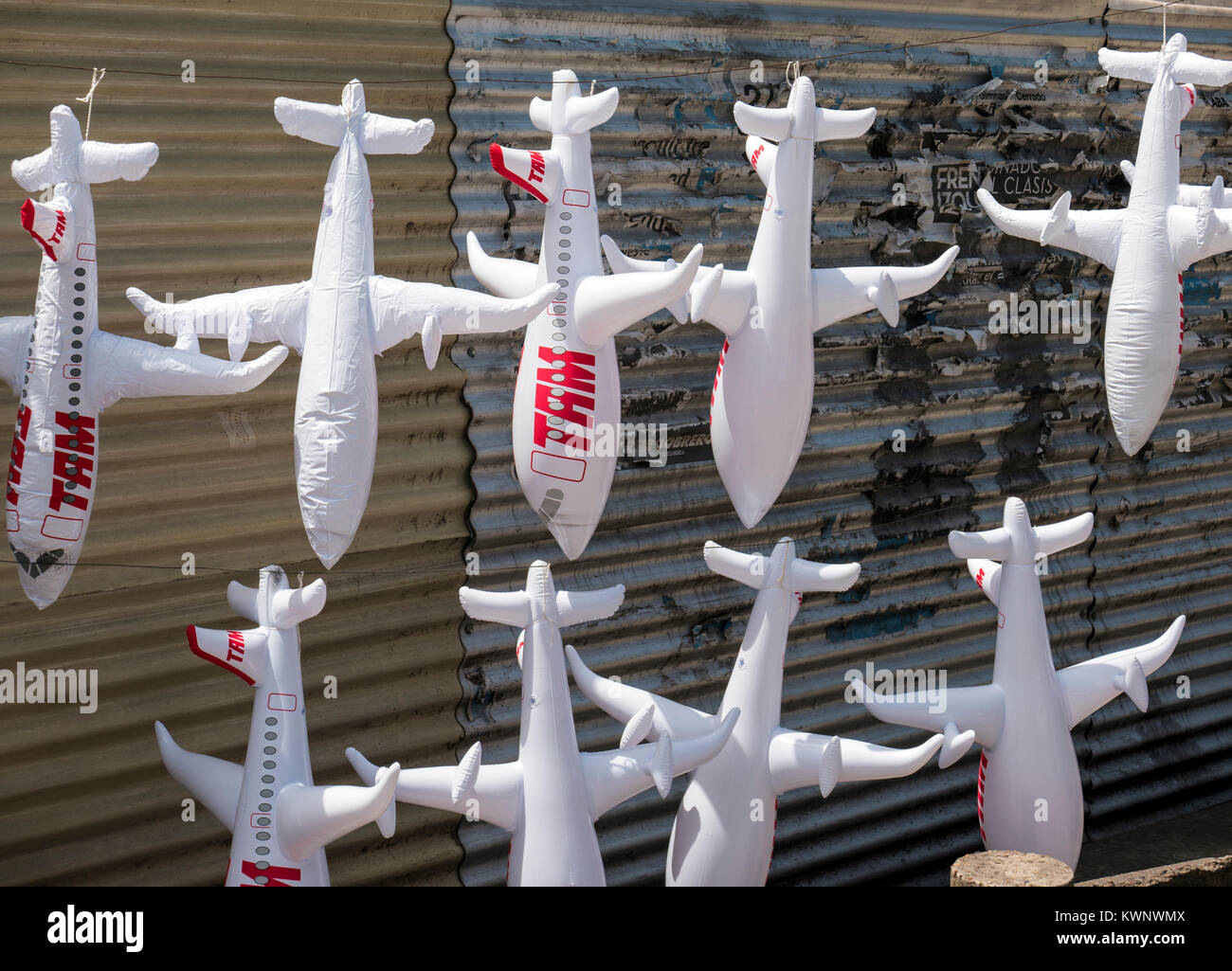 Inflatable airplane toys hanging at outdoor park along coast near Aeroparque Jorge Newbery; Buenos Aires; Argentina Stock Photo