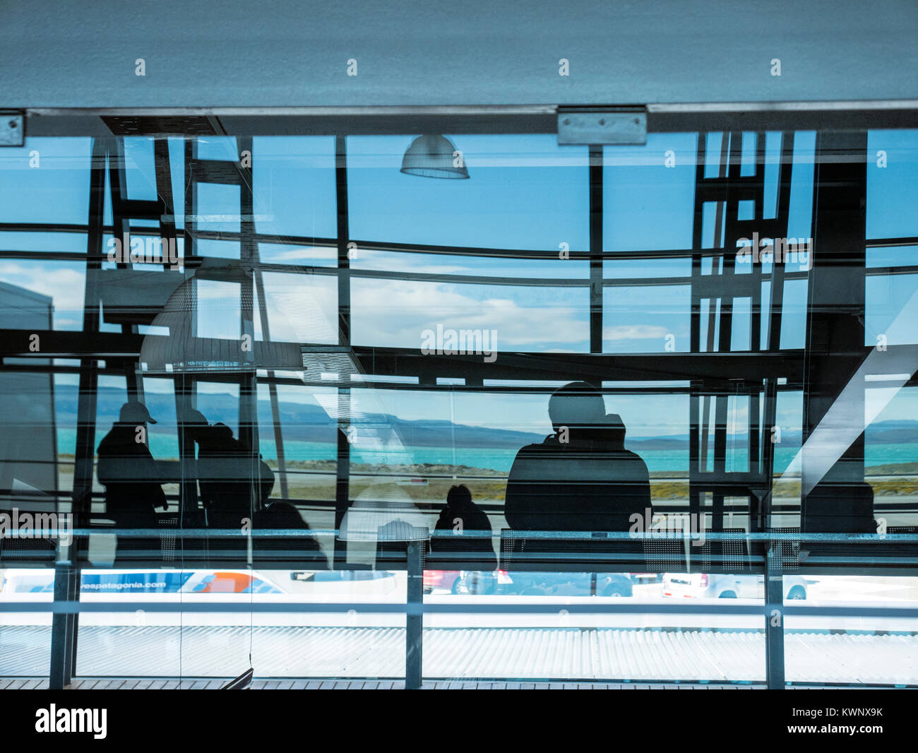 Interior abstract view of travelers at El Calafate International Airport; El Calafate Santa Cruz, Argentina; Comandante Armando Tola International Air Stock Photo