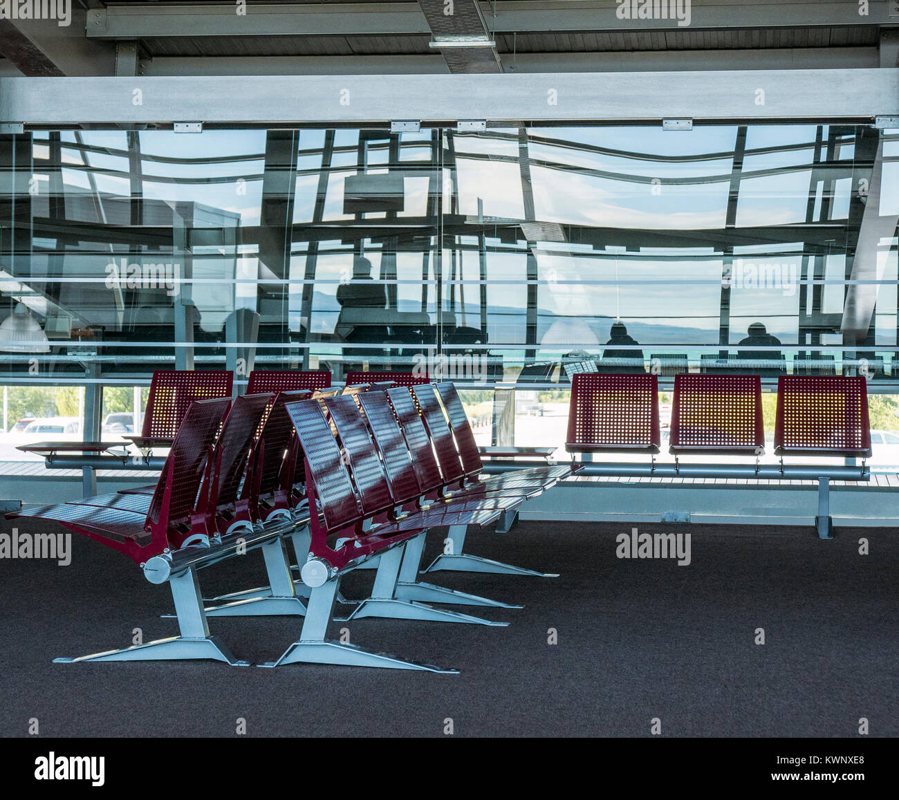 Empty seats; interior abstract view of El Calafate International Airport; El Calafate Santa Cruz, Argentina; Comandante Armando Tola International Air Stock Photo