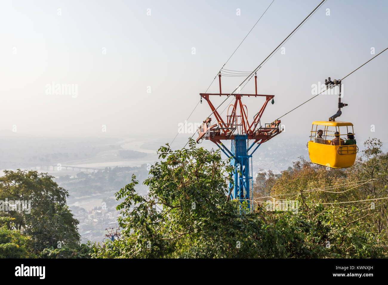 Ropeway (cable car) carrying pilgrims to the Mansa Devi temple in Haridwar,  India Stock Photo - Alamy