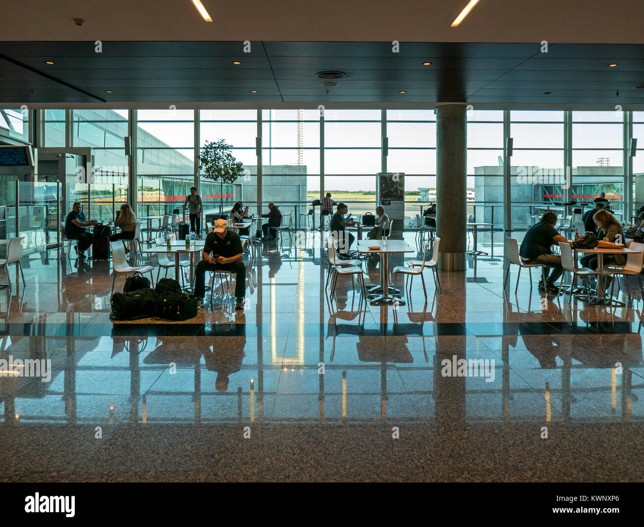 Abstract interior view of patrons at cafe; Ministro Pistarini International Airport; Ezeiza; Buenos Aires; Argentina Stock Photo