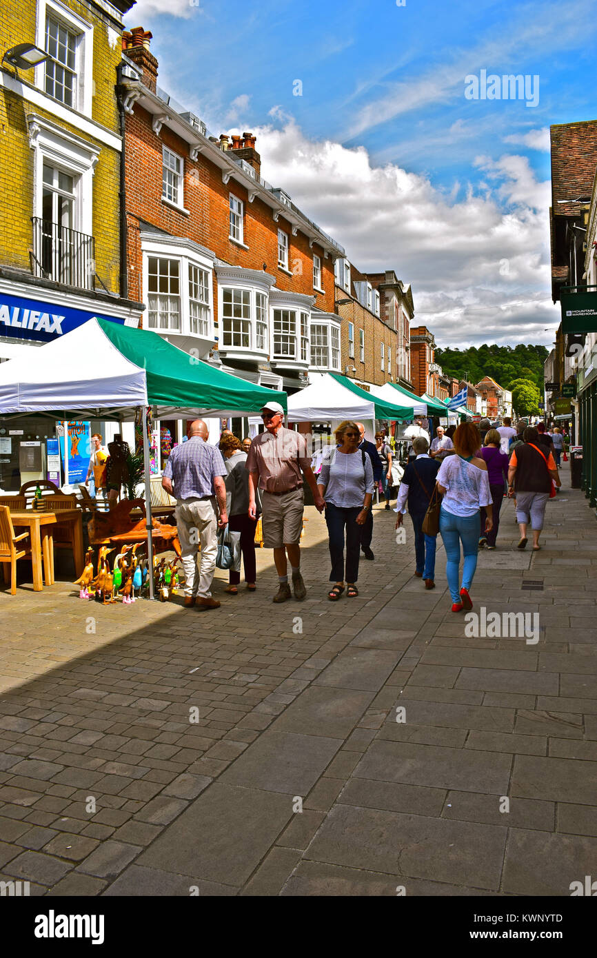 Shoppers strolling through the street market in the High Street