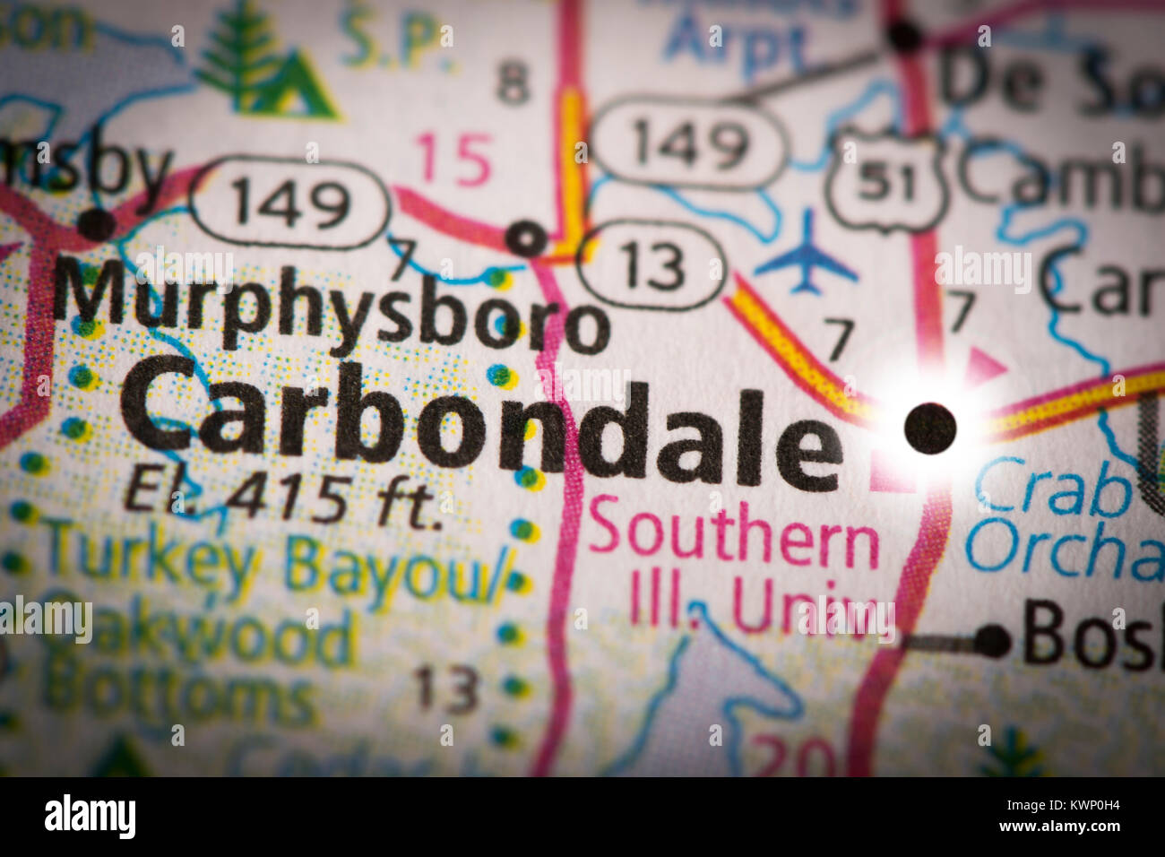 Closeup of Carbondale, IL on a road map of the United States with the