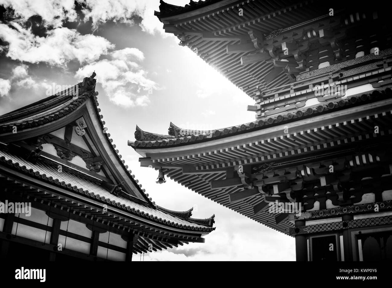 Architectural detail of Sanjunoto pagoda building at Kiyomizu-dera Buddhist temple in Kyoto, Japan in Black and white Stock Photo