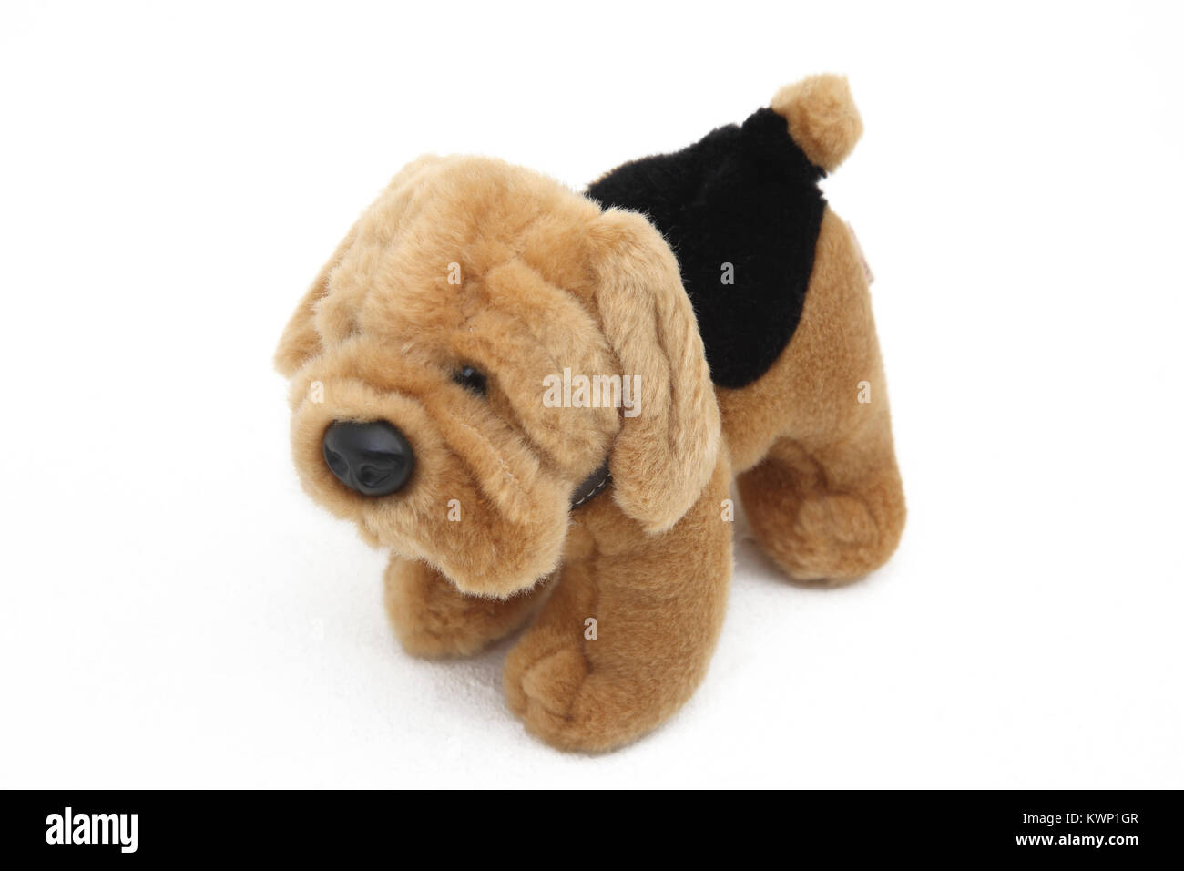 Brown and Black Soft Toy Dog By Keel Toys Stock Photo