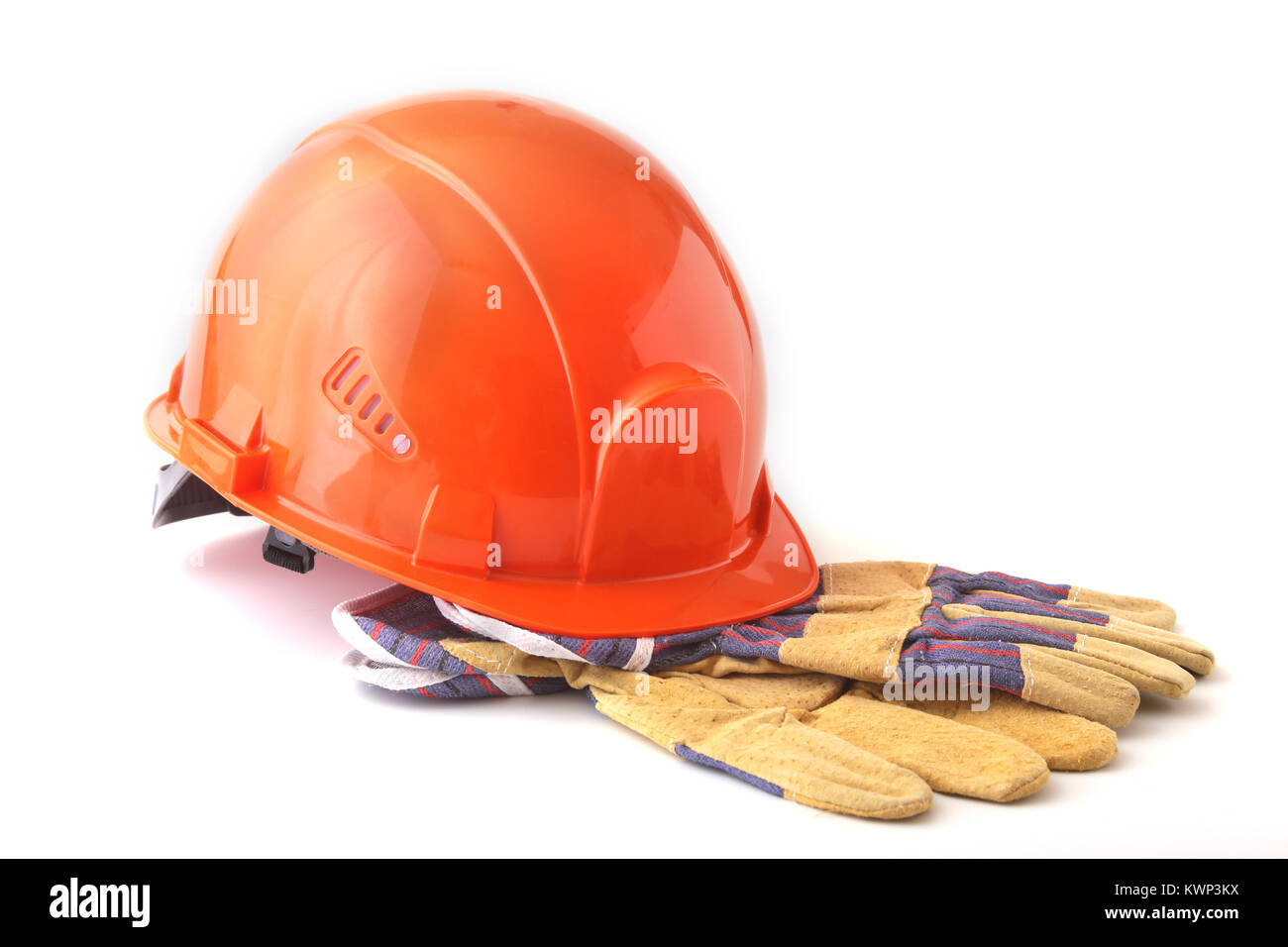 Orange hard hat, safety gloves on white 